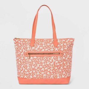 Bolso de mano color duranzo y estampado floral marca A New Day