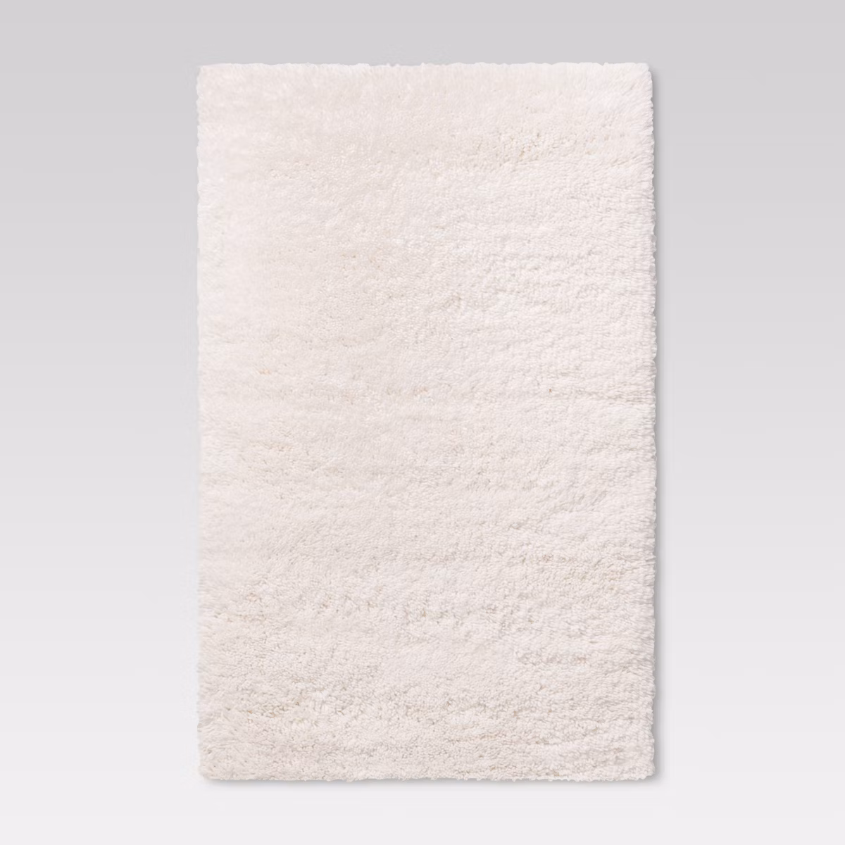 Alfombra color blanca de 4’x5’6″ – Room Essentials